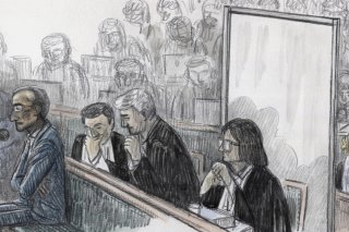 Dans la salle d'audience, "Brigitte" a été placée derrière un paravent pour ne pas croiser le regard de Tariq Ramadan, qu'elle accuse de l'avoir violée.